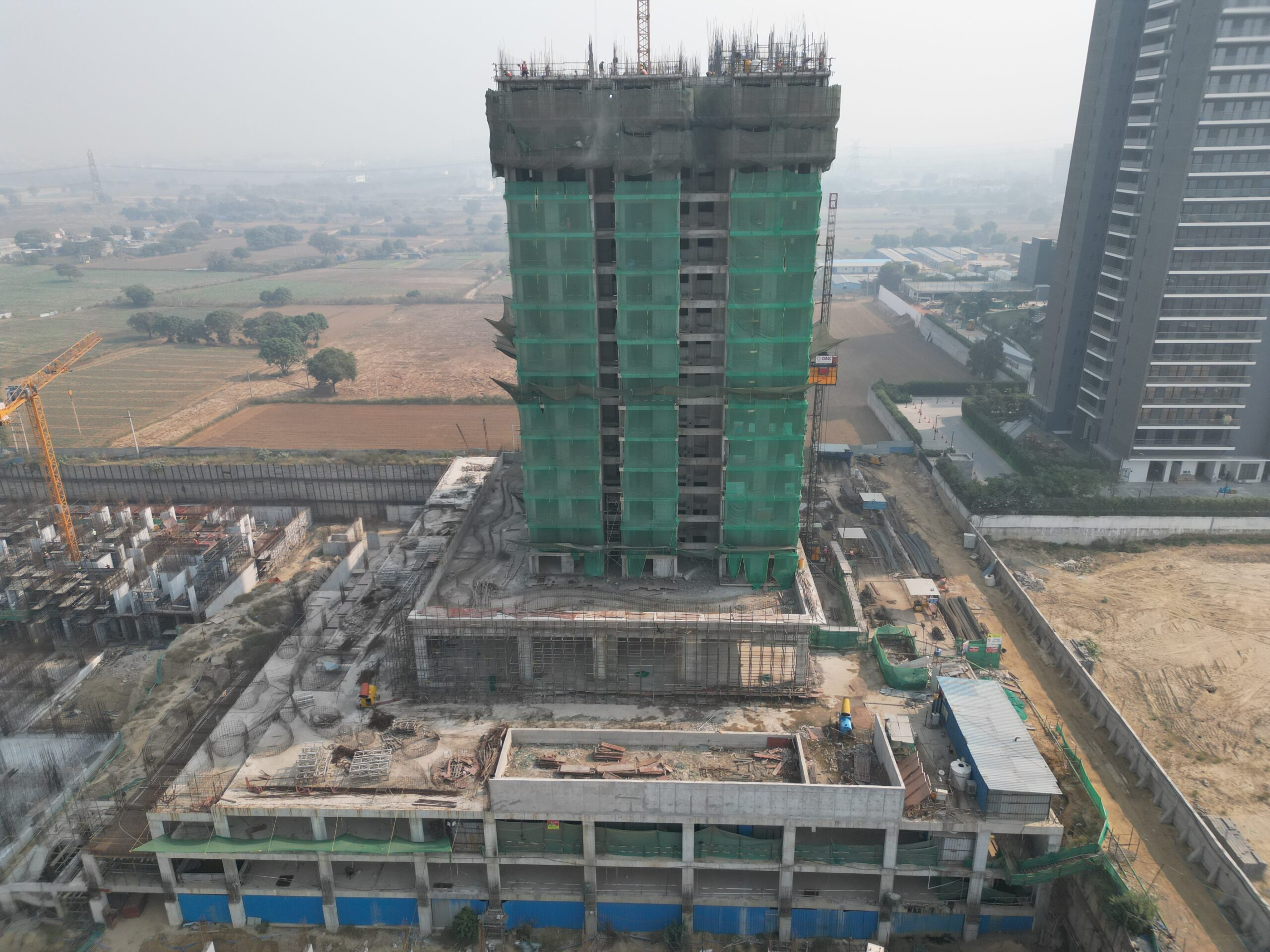construction progress of Tower C at the Vatika Towers complex on Golf Course Road in Gurgaon, India.
