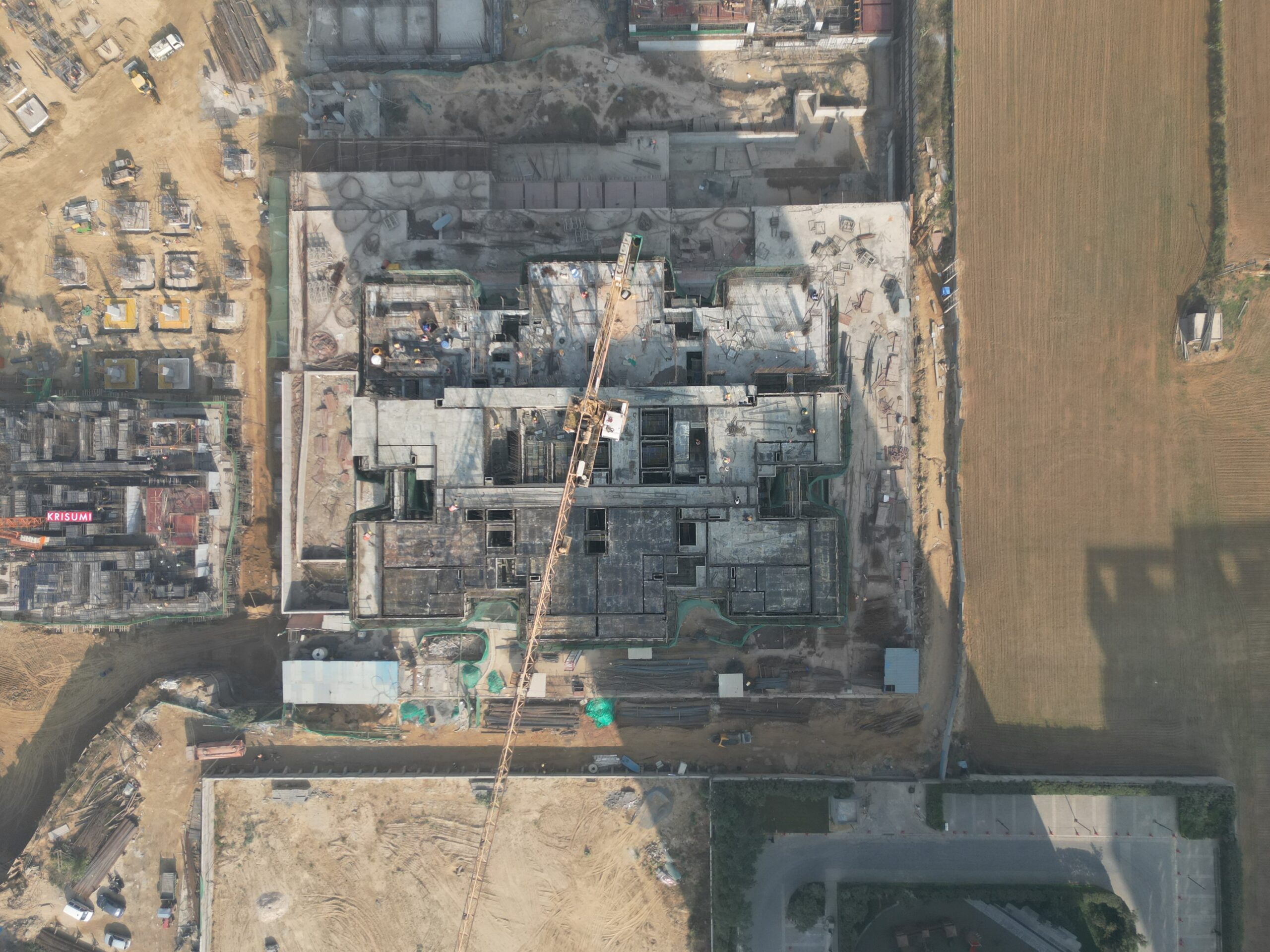 Aerial view of the construction site for the Krisumi Waterfall Residences project in Sector 36A, Gurgaon, India.